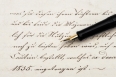 calligraphic handwritten text and vintage ink pen