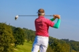 Man playing golf